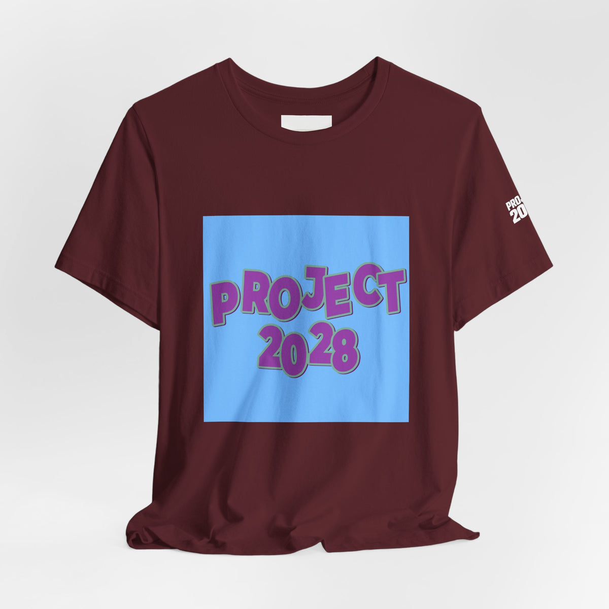 Project 2028 Tee — 'Democracy Isn’t Automatic' Political Campaign T‑Shirt - Make a Statement Without Saying a Word!