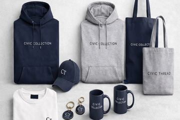 Collection of 'Civic Collection' products including hoodies, a tote bag, a cap, a mug, and keychains on a light gray background.